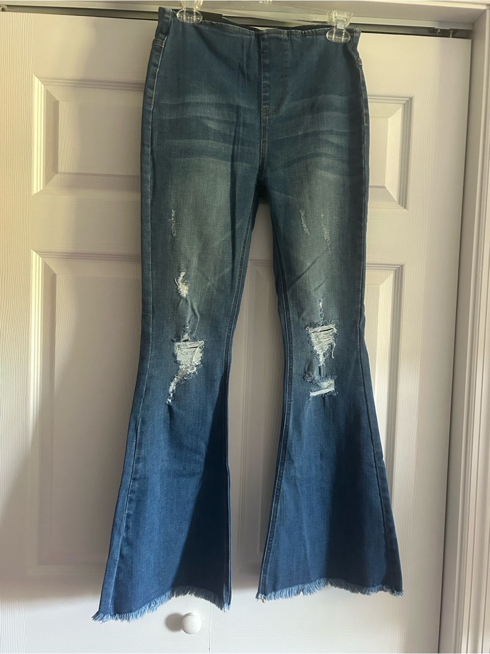 High-Rise Distressed Pull up Flare Jeans